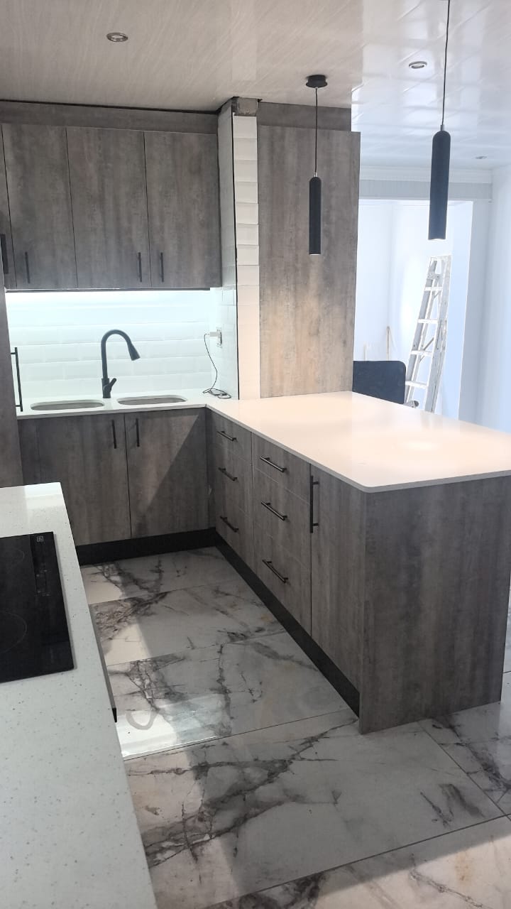 Kitchen with built-in oven