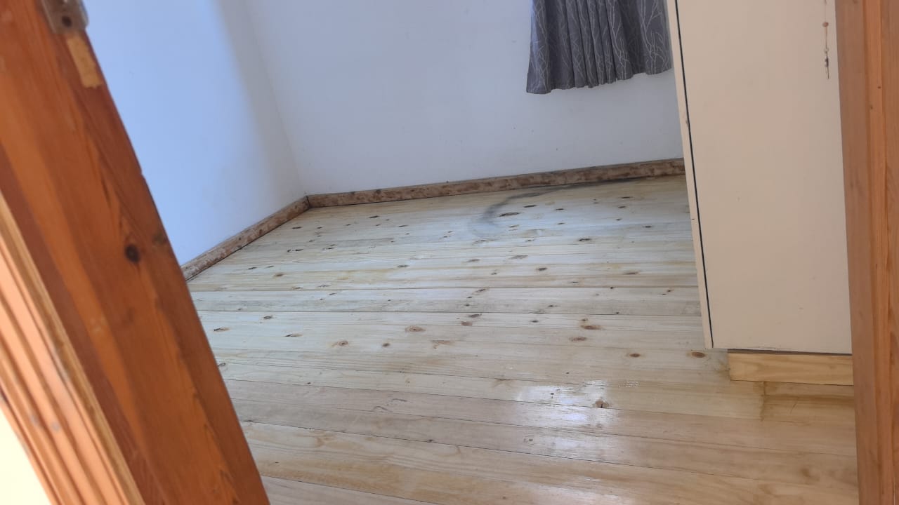 Bedroom with timber floor