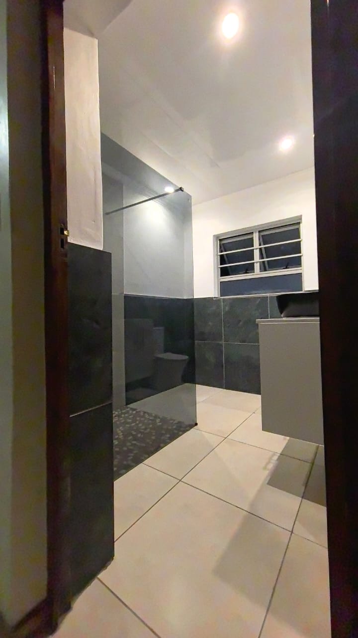 Hallway to bathroom
