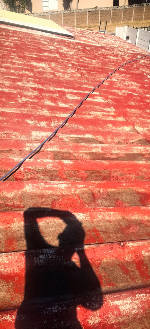 Roof painting in progress
