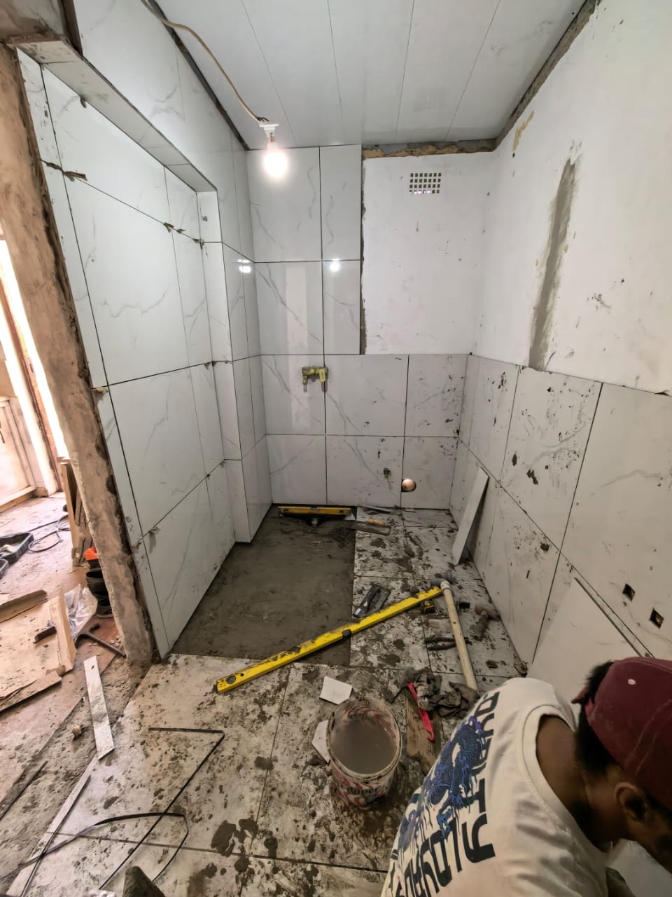 Bathroom tiling underway