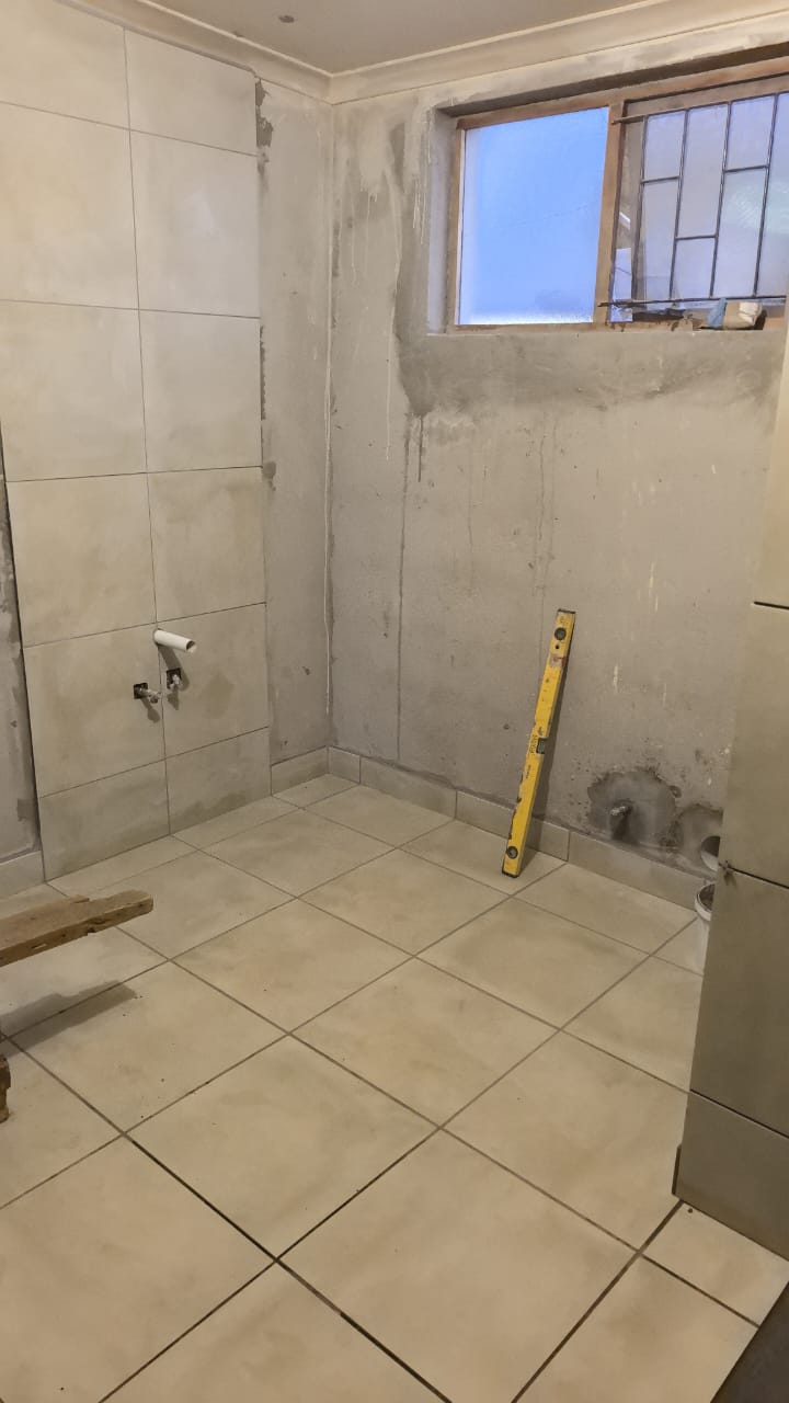 Tiled bathroom in progress