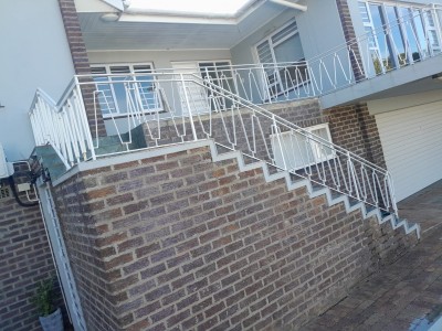 White steel staircase balustrade